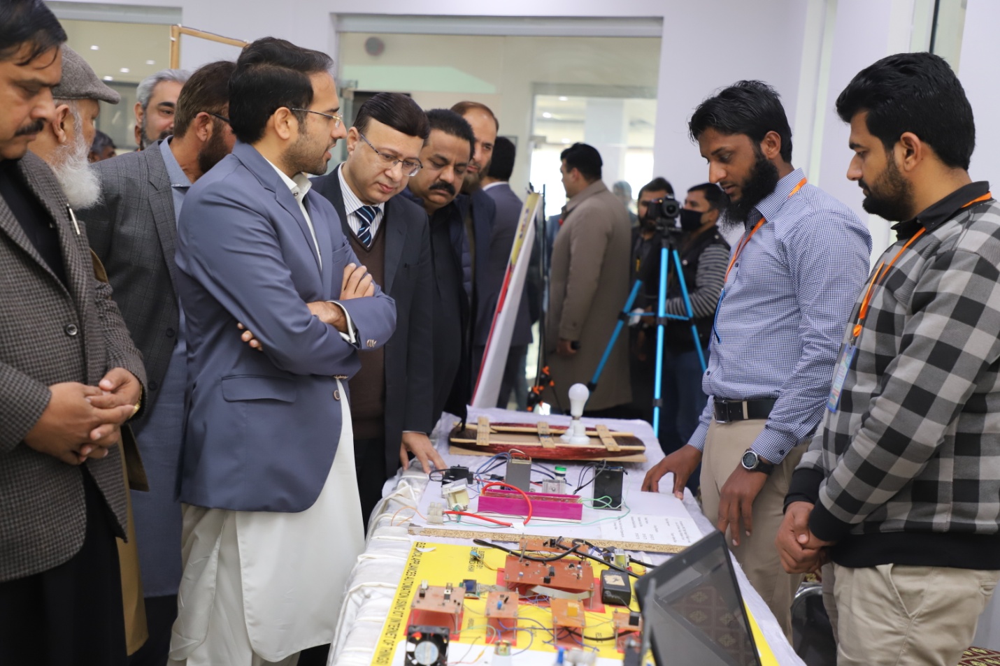 Prof_Dr_Muhammad_Akram_Shaikh_and_Minister_Hafiz_Mumtaz_Ahmad_visit_stalls_at_the_PASTI_UAF_STEM_&_IT_Expo_Jan_2020.jpg